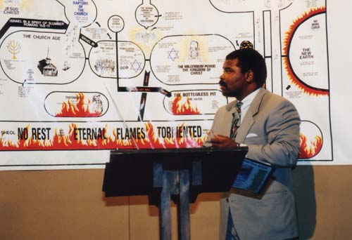 Evangelist Perkins Teaching in front of Bible Prophecy Chart